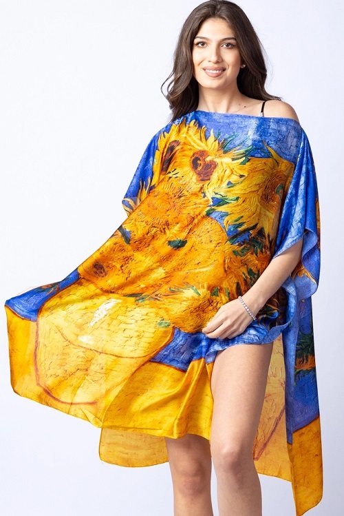 Rochie de plaja tip poncho din matase cu stilizare "Floarea Soarelui" pe fond albastru Pret 79 RON, Comanda pe Shopika